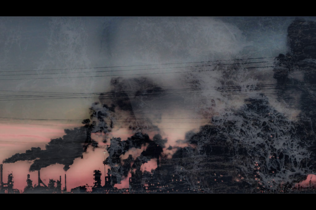 Blurry image of Marie's face superimposed over pollution from buildings. The image is red, grey and black.